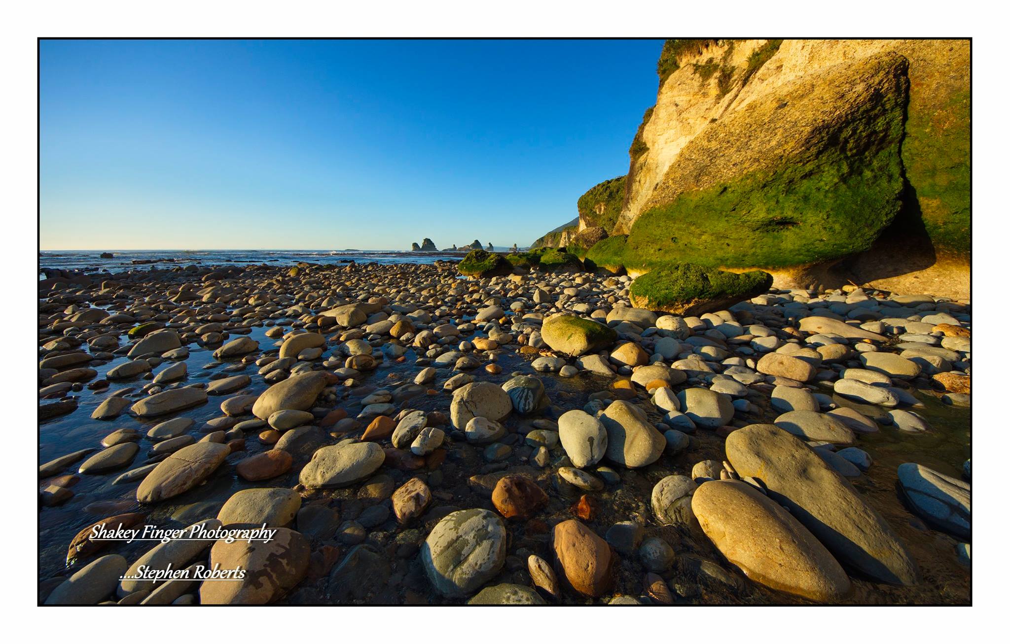 rocky shoreline and cliffs motukiekie beach